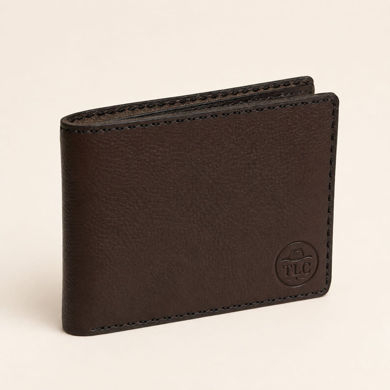 TLC Coastal Heritage Bifold Wallet in chocolate-brown leather, closed view