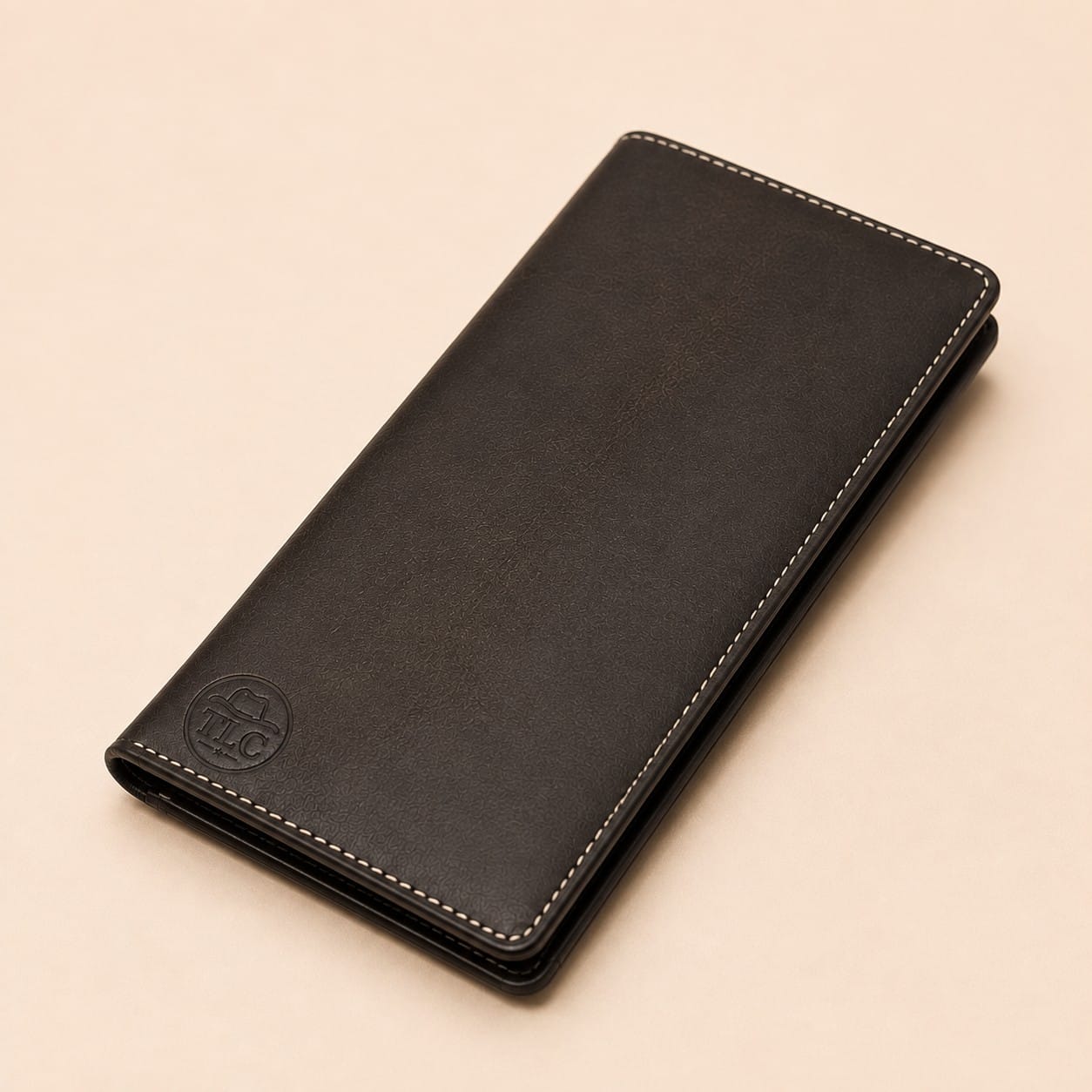 TLC Heritage Long Folio Wallet in dark brown-black leather, closed hero view