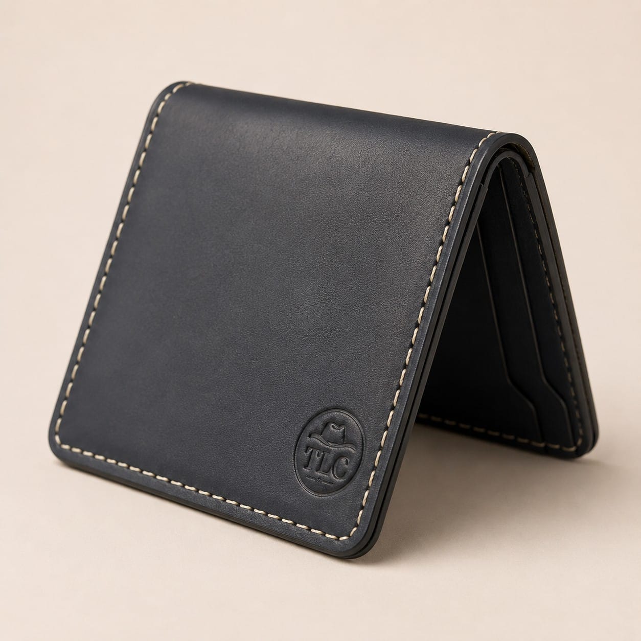 TLC Heritage Noir Bifold Wallet standing open at an angle
